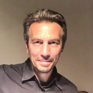 A headshot of a man.
