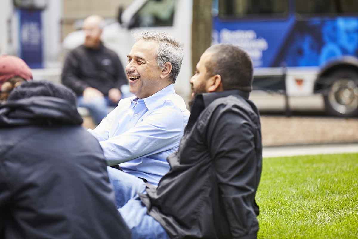 A man laughing outside