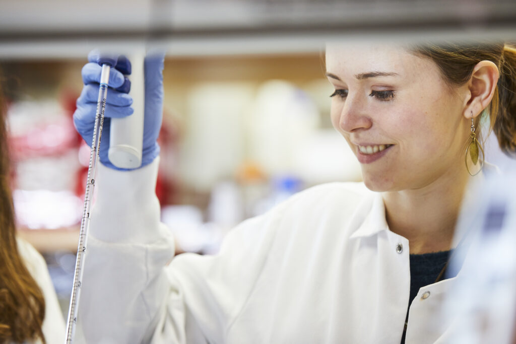 Woman scientist in lab using serological.