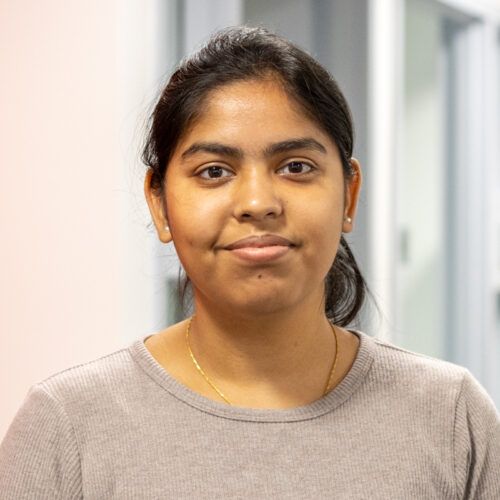 Swethika Balasankar smiles in the IPI office.